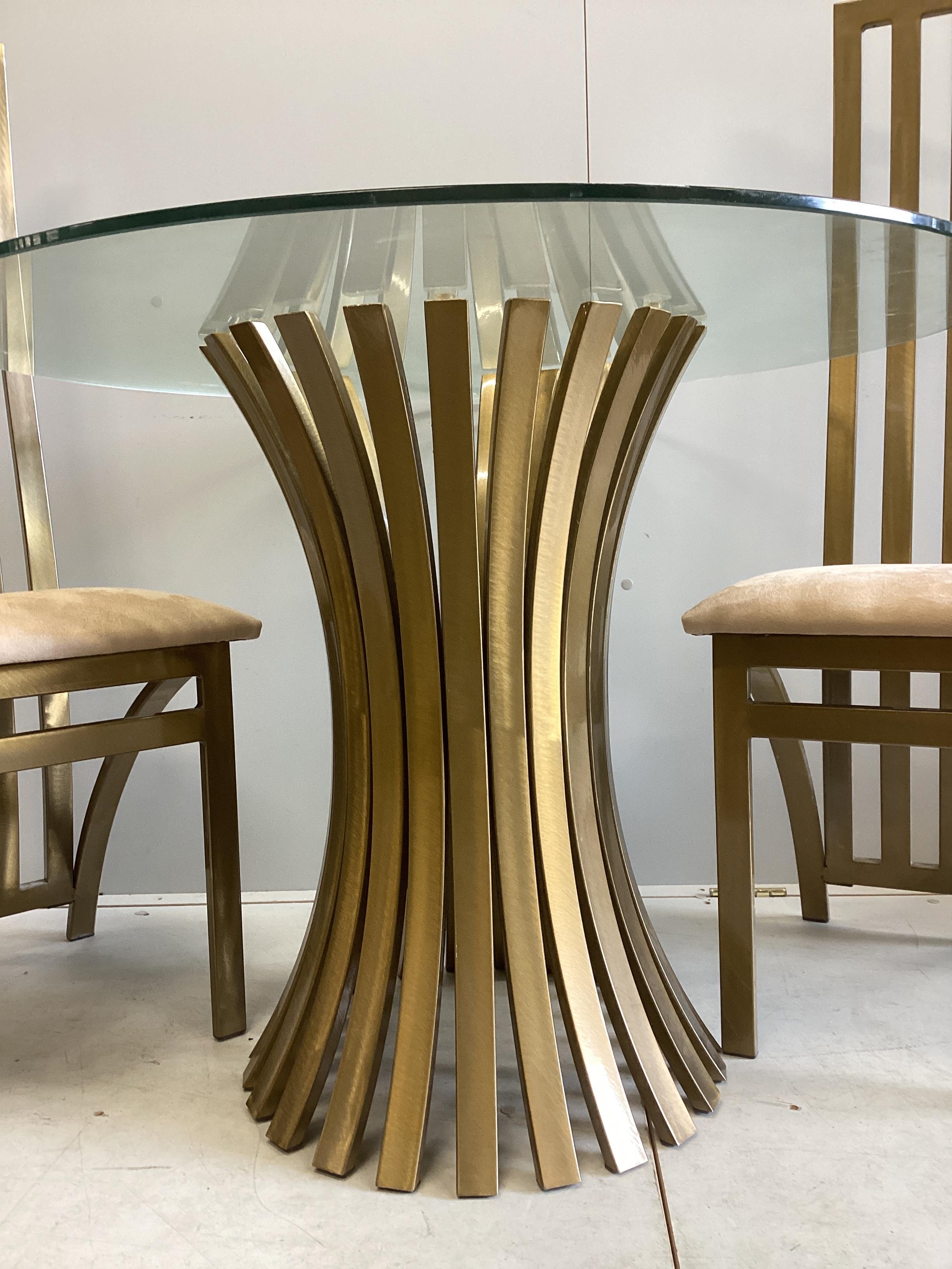 A Contemporary Italian design circular gilt metal glass top table, diameter 100cm, height 74cm, and two chairs